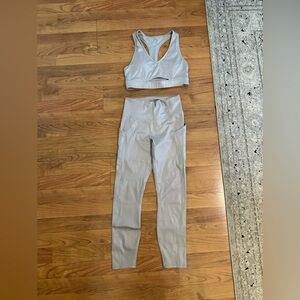 Gray shiny Fabletics legging and sports bra set